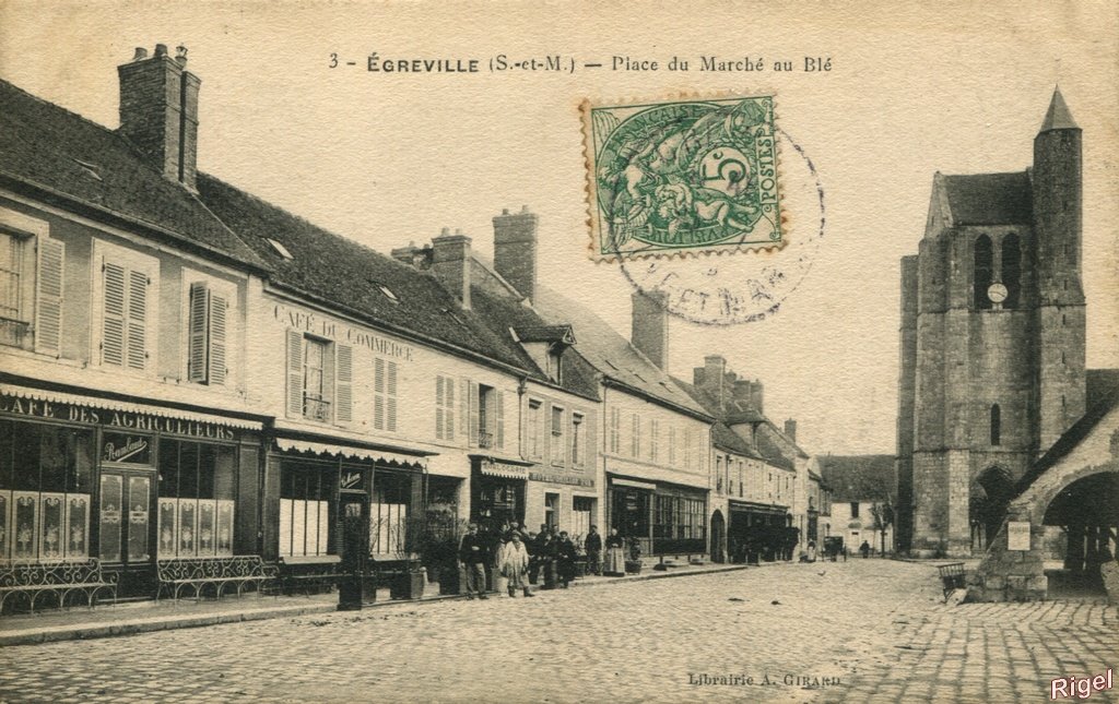 77-Egreville - Place du Marché au Blé - 3 Librairie A Girard.jpg