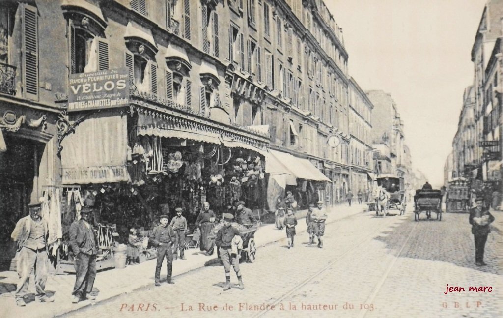 Paris XIXe - La Rue de Flandre à hauteur du 103.jpg